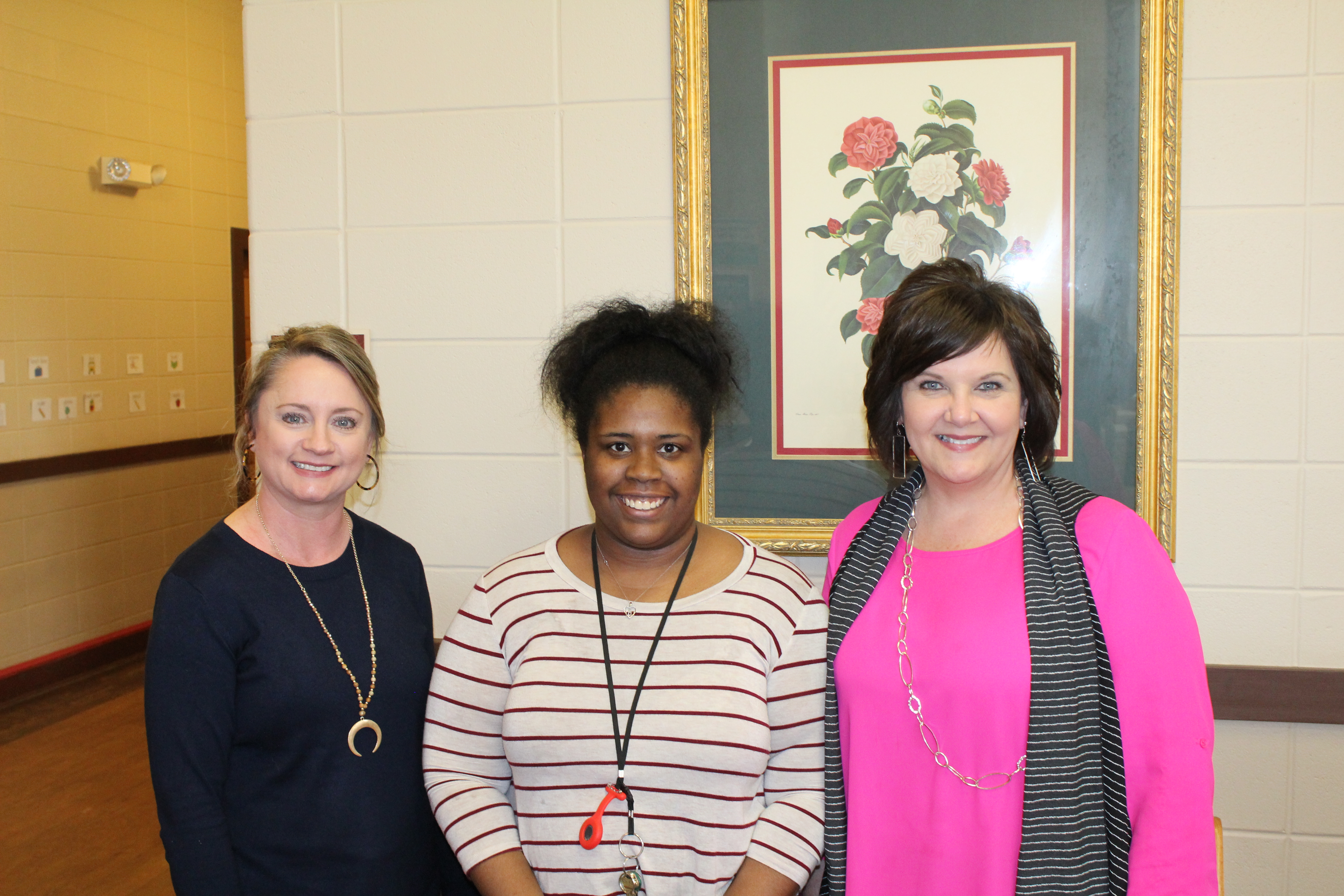 LaTia Carr with Planters First Bank Team Members
